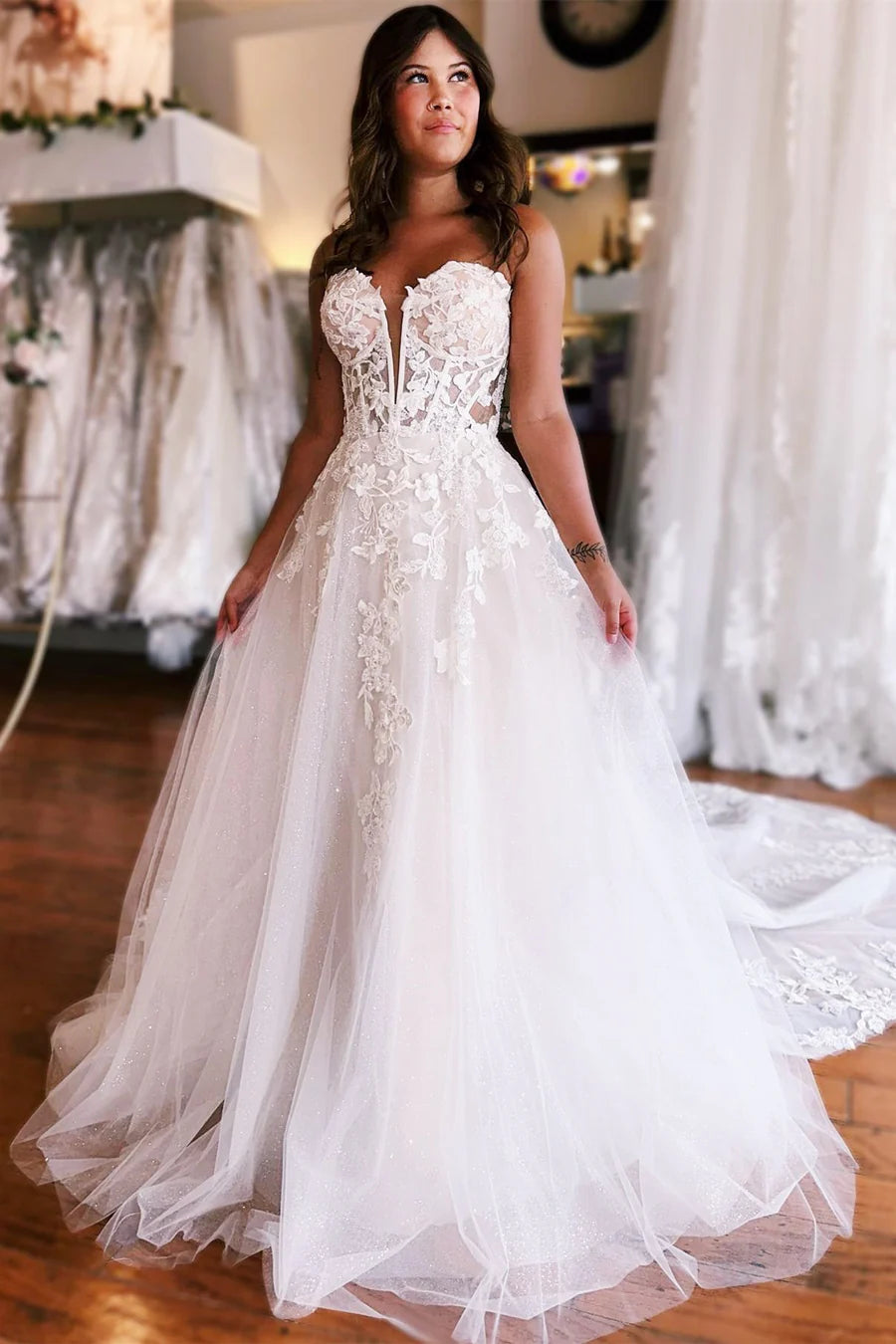 Robe de mariée trapèze avec appliques en tulle et bustier